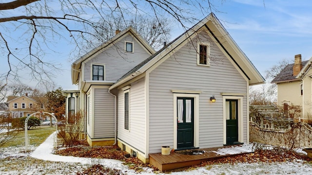 view of snow covered house