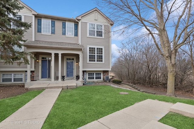 view of front of home with a front lawn