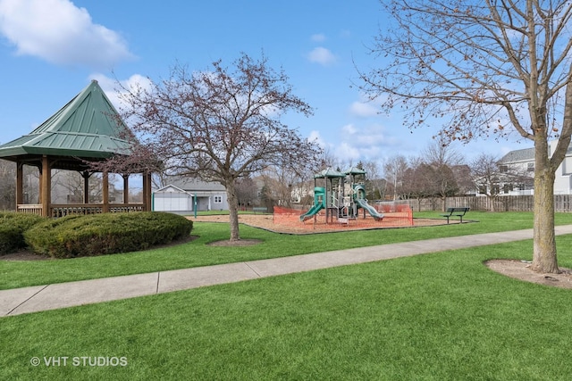 view of playground with a gazebo and a lawn