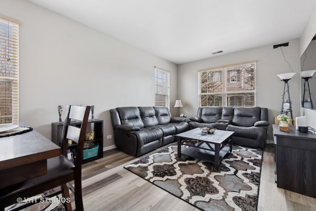 living room with light wood-type flooring