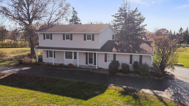 view of front of home with a front lawn