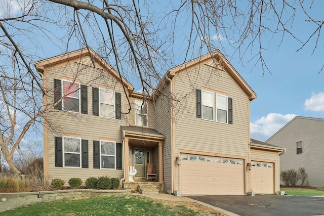 view of front of home featuring a garage