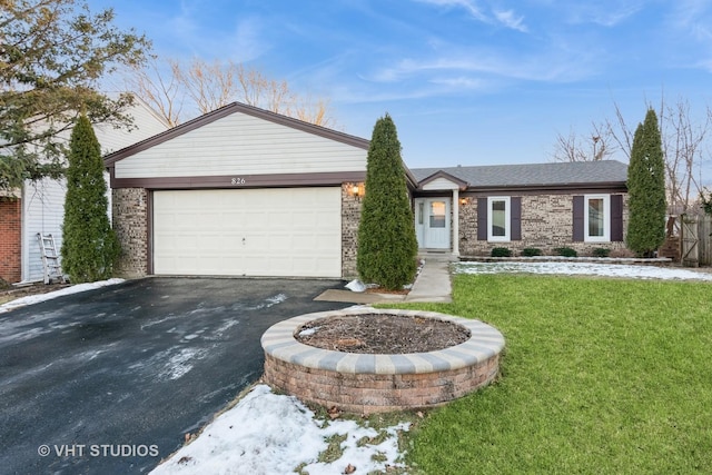 ranch-style home with a garage and a front lawn