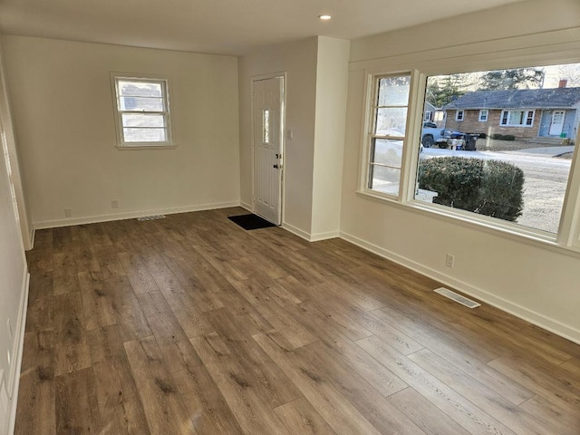 entrance foyer featuring hardwood / wood-style floors