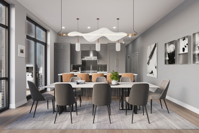 dining space with light wood-type flooring