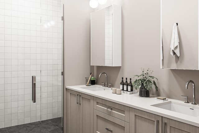 bathroom with a stall shower, tile patterned flooring, a sink, and double vanity