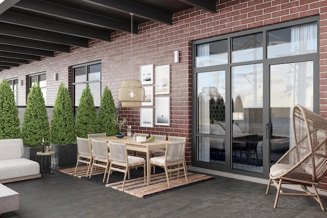 view of patio featuring a ceiling fan and outdoor dining space