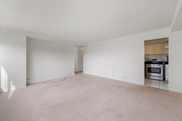 unfurnished living room with light carpet