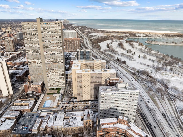 bird's eye view with a water view and a view of the beach