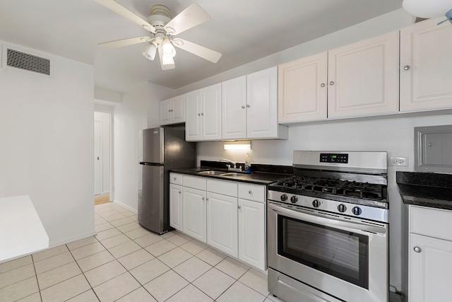 kitchen with ceiling fan, white cabinetry, sink, and appliances with stainless steel finishes