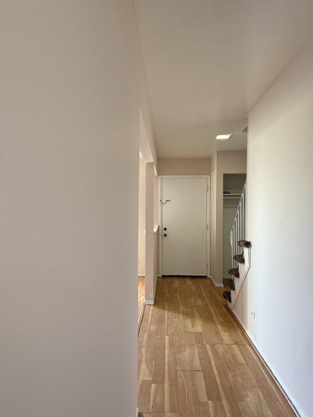 hallway featuring light hardwood / wood-style floors