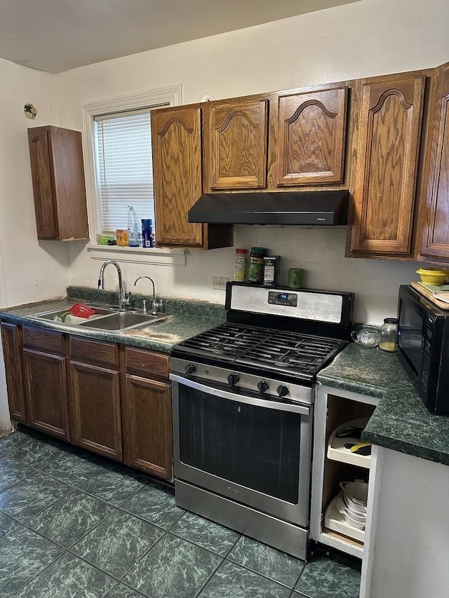 kitchen featuring sink and stainless steel gas stove