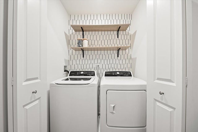 laundry area with washer and clothes dryer