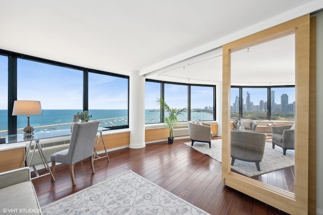 sunroom with a water view