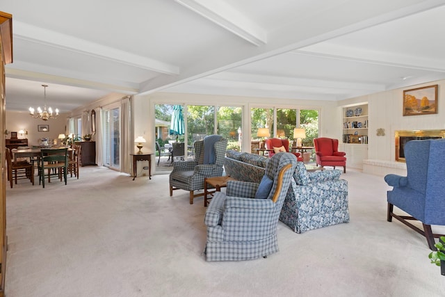 living room with light carpet, built in features, beamed ceiling, and a notable chandelier