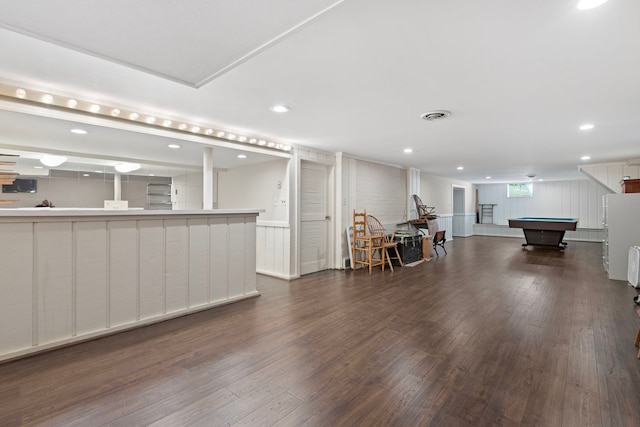 bar featuring dark hardwood / wood-style flooring and pool table