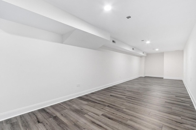 empty room featuring dark hardwood / wood-style floors