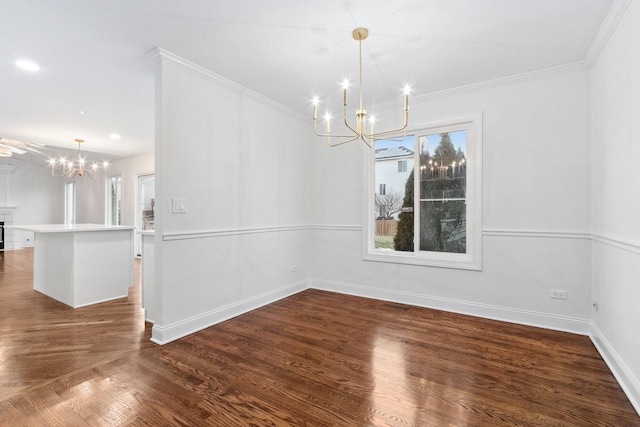 unfurnished dining area with ornamental molding, dark wood-type flooring, and a notable chandelier