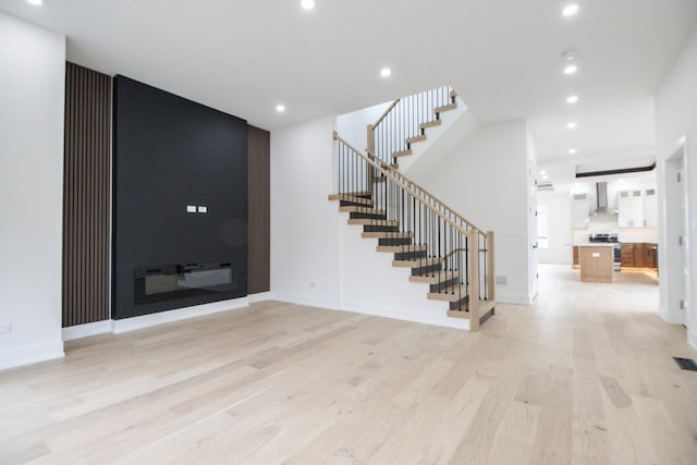 foyer entrance featuring light wood-type flooring