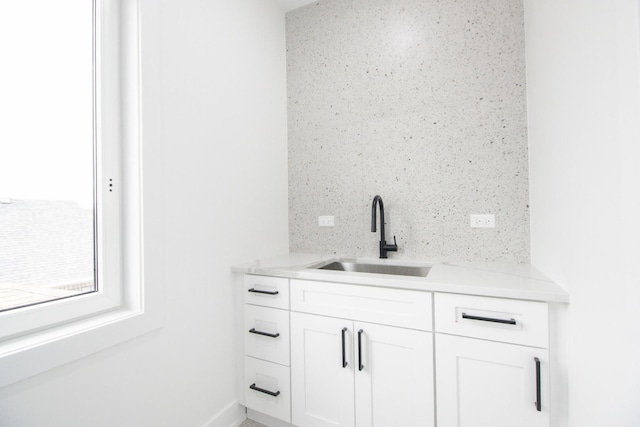 bathroom with backsplash and vanity