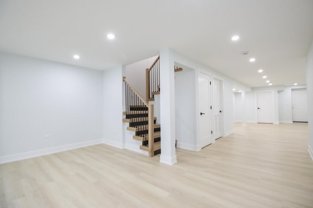 basement featuring light hardwood / wood-style flooring