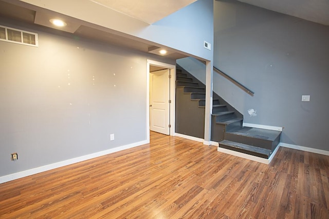 basement featuring wood-type flooring