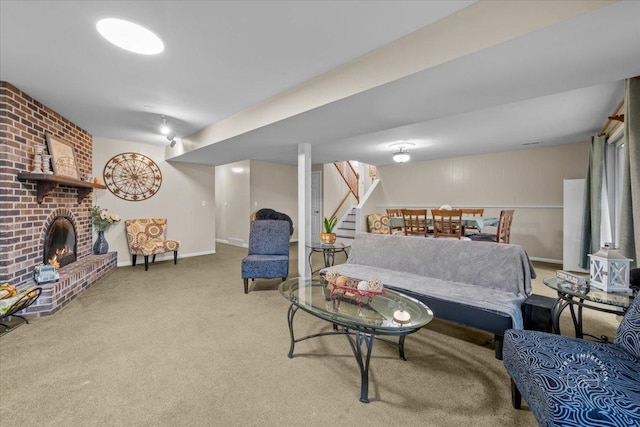 carpeted living room with a brick fireplace