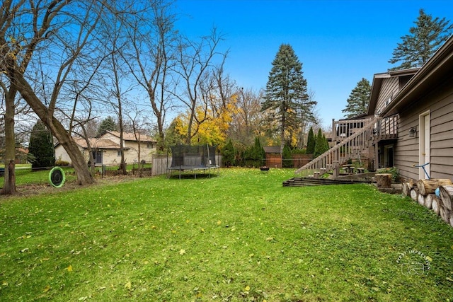 view of yard with a trampoline