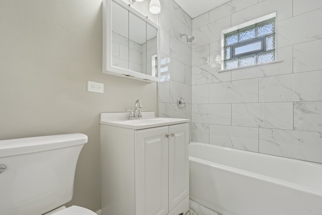 full bathroom with tiled shower / bath combo, toilet, and vanity