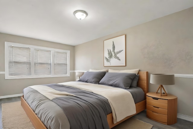 bedroom with wood-type flooring