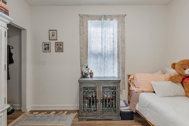 bedroom featuring hardwood / wood-style floors