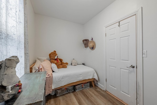 bedroom featuring light hardwood / wood-style floors