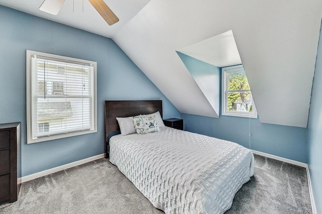 bedroom with carpet flooring, ceiling fan, and lofted ceiling