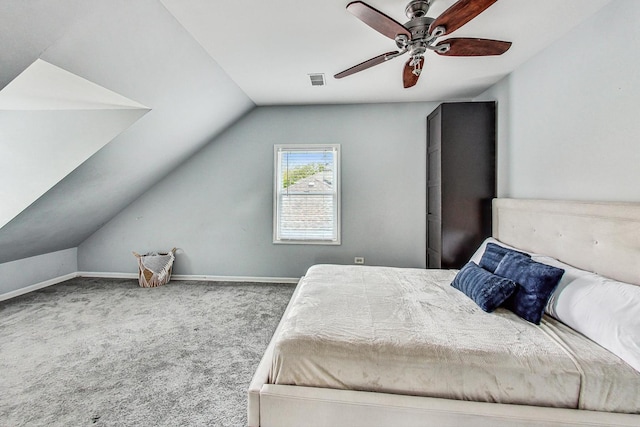 bedroom featuring carpet flooring, vaulted ceiling, and ceiling fan