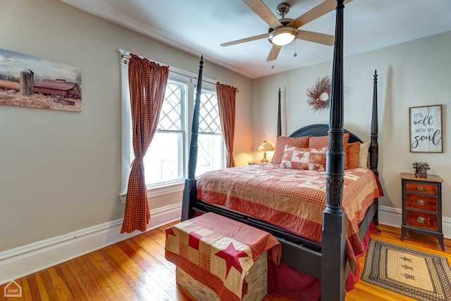 bedroom featuring ceiling fan and light hardwood / wood-style floors