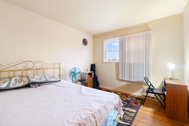 bedroom featuring wood-type flooring