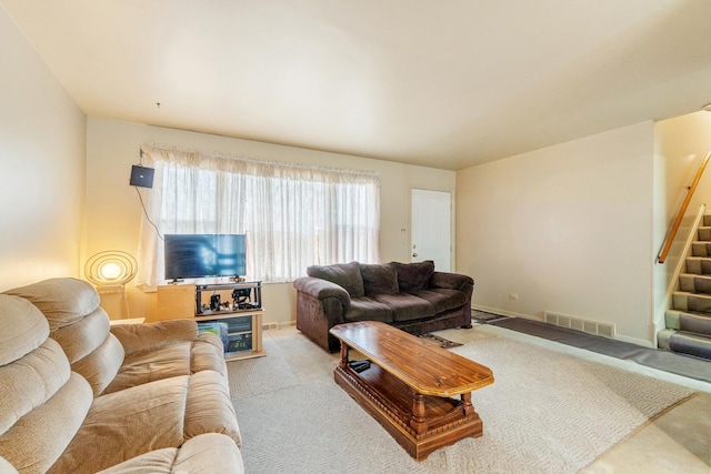 living room with light colored carpet