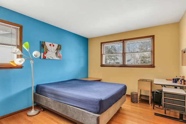 bedroom featuring light wood-type flooring