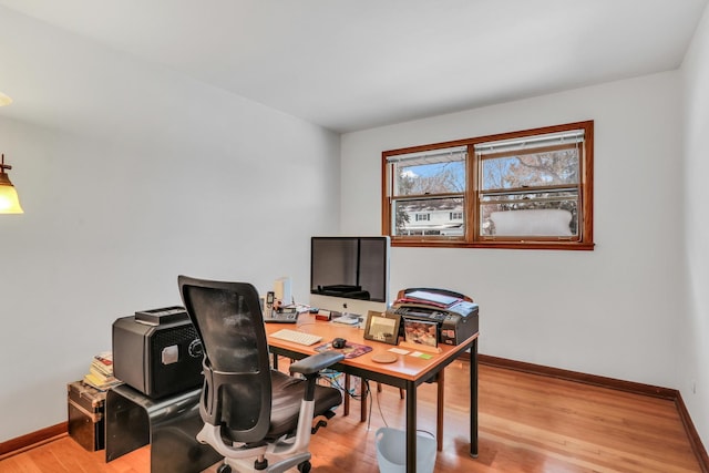 office area with light hardwood / wood-style flooring