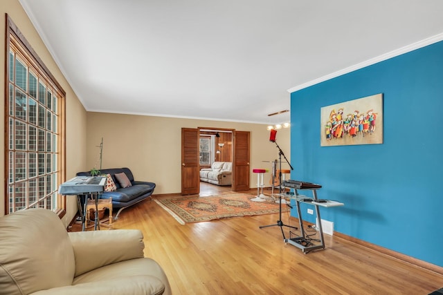 living room featuring crown molding and wood-type flooring