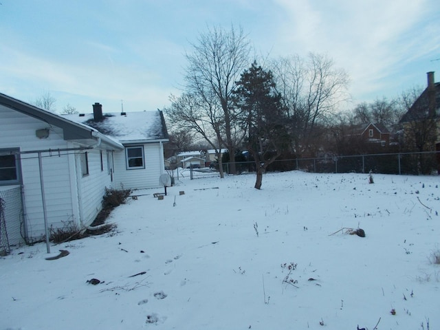 view of snowy yard