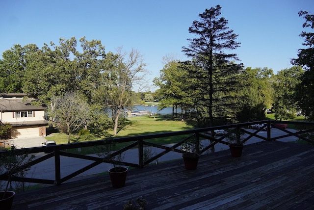 deck featuring a water view