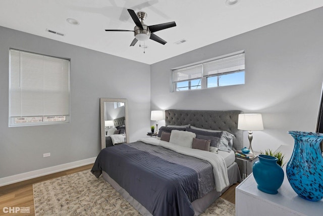 bedroom featuring ceiling fan and light wood-type flooring