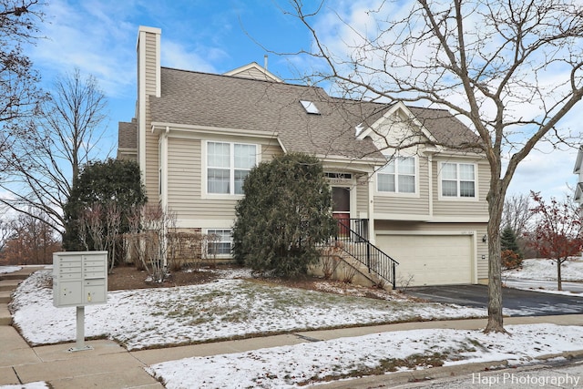 view of front of home with a garage