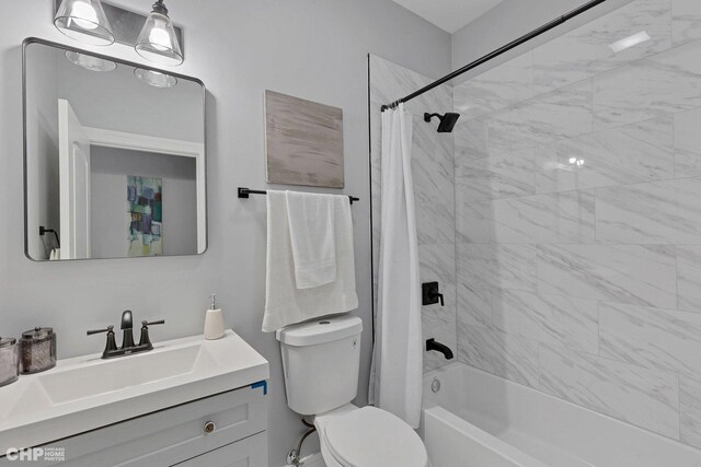 full bathroom featuring shower / bath combo, vanity, and toilet