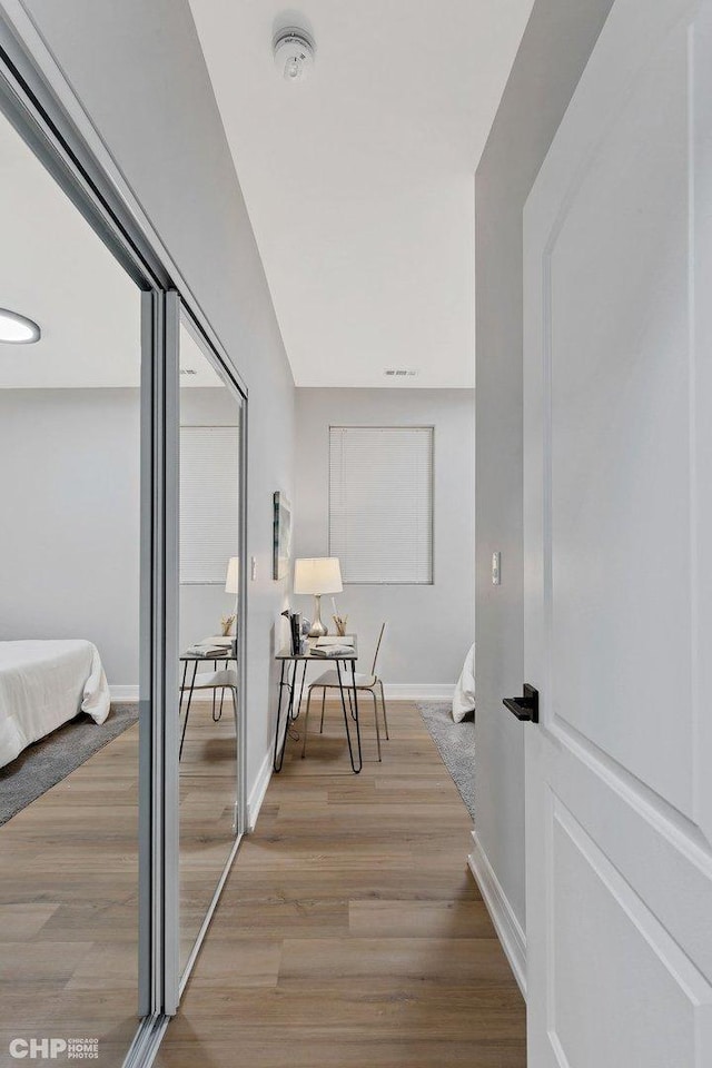 hallway featuring light hardwood / wood-style floors