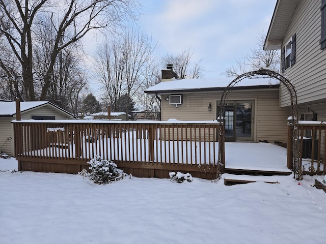 view of snow covered deck