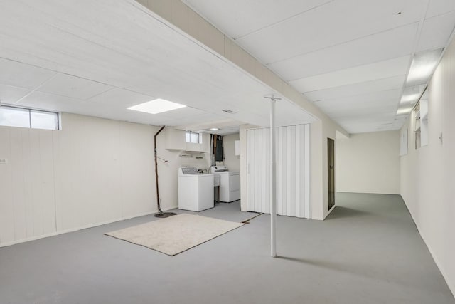 basement featuring separate washer and dryer