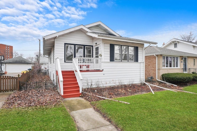 bungalow with a front yard