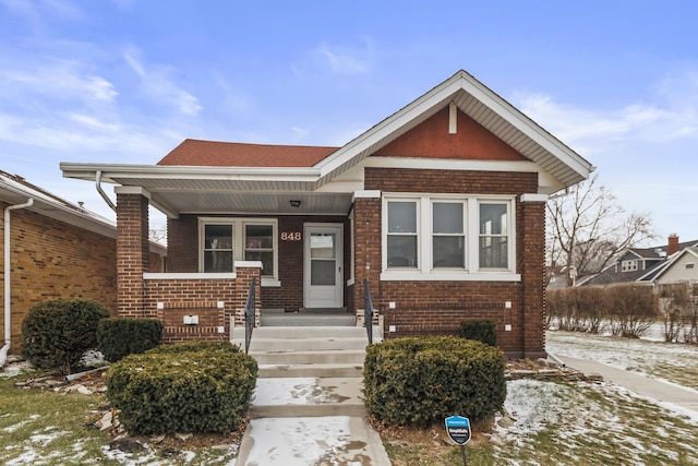 bungalow-style home with covered porch